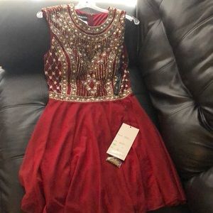 Gorgeous formal Dress!!!! Color is (wine)